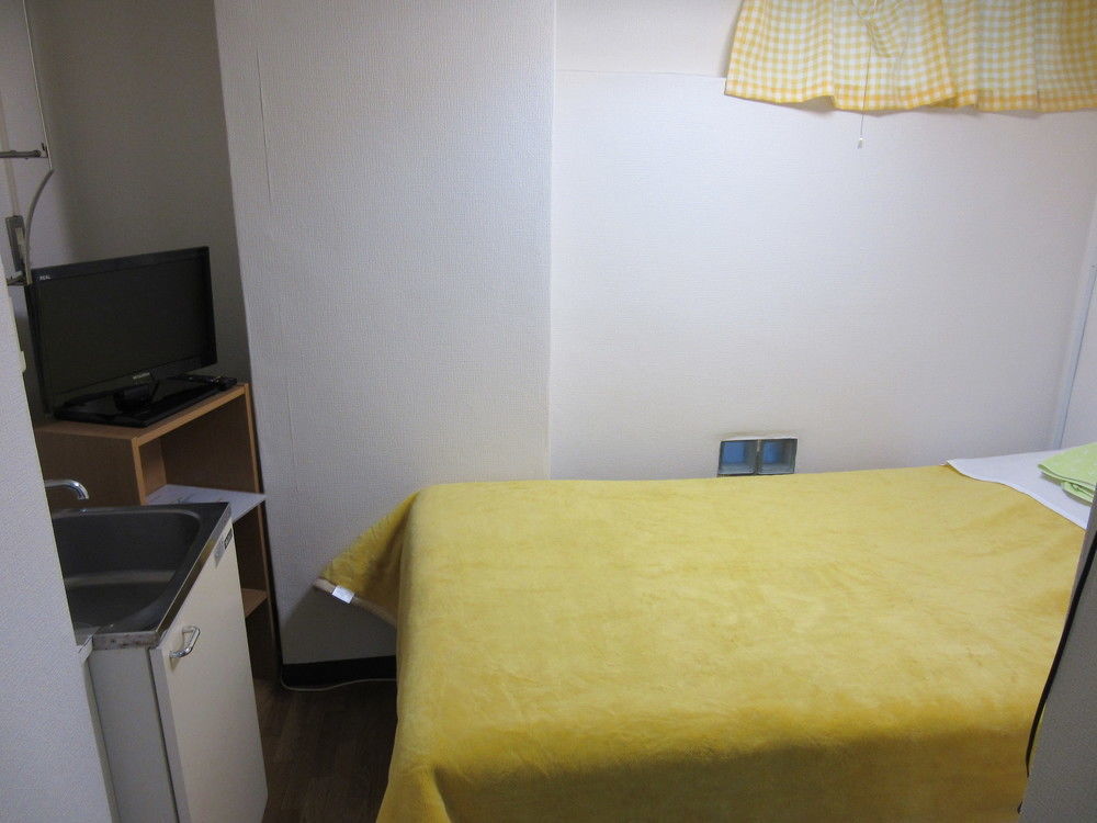 Apartment Kurumi Weekly Mansion *