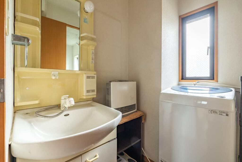 Apartment アンドステイ西新井 *
