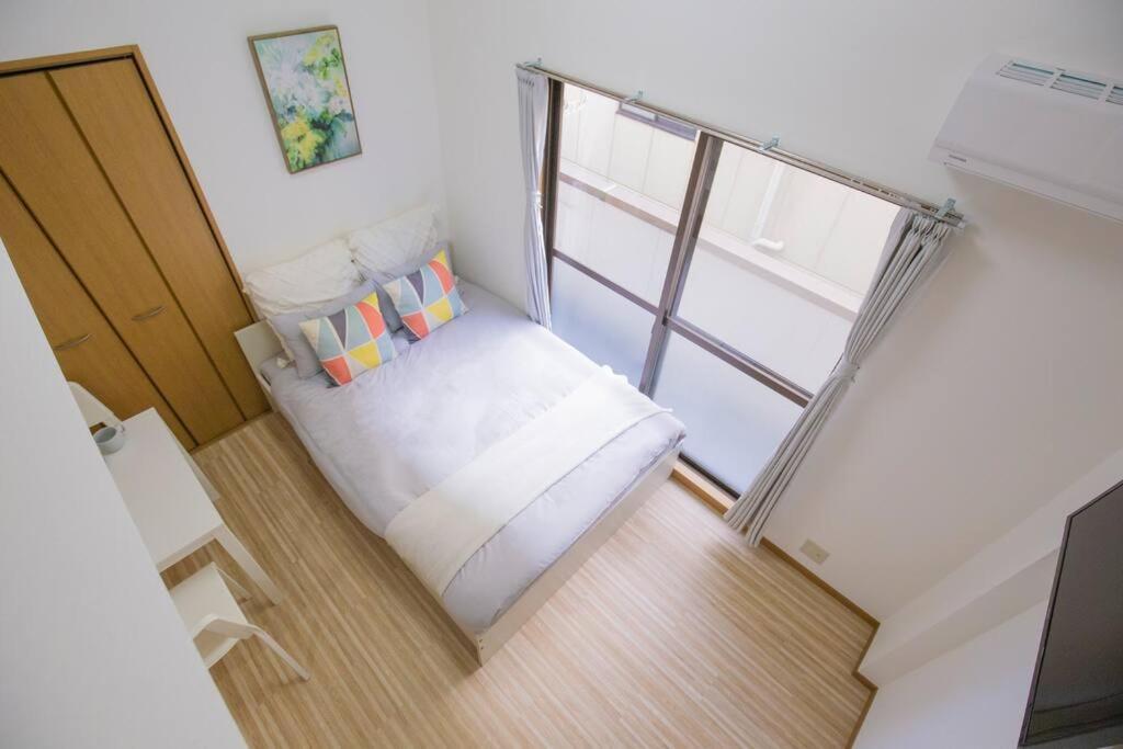 閑静な住宅街_暖かく居心地の良いデザイン Eos-j Apartment
