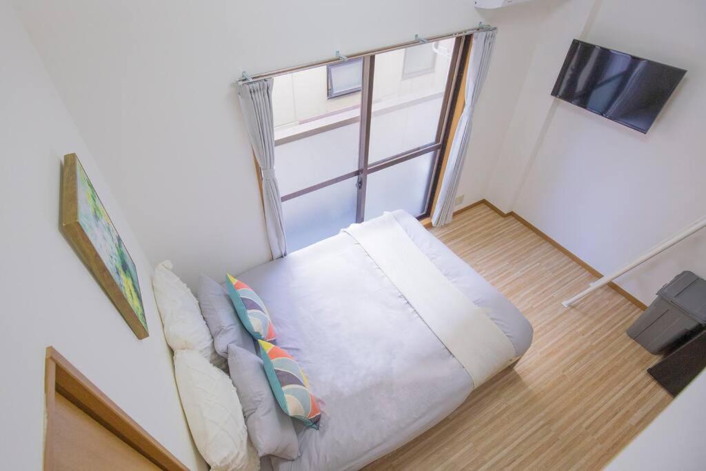 閑静な住宅街_暖かく居心地の良いデザイン Eos-j Apartment