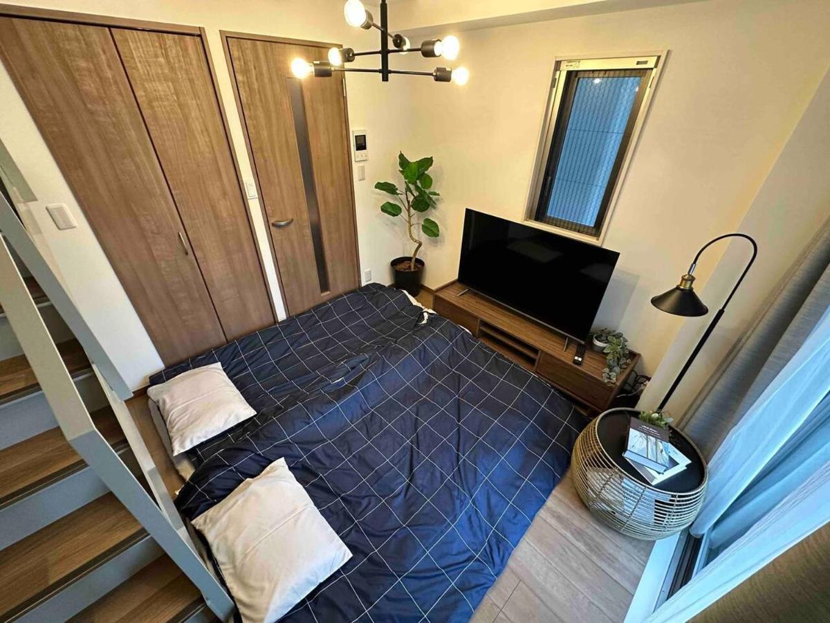Apartment 上野駅徒歩５分シングルベッド４台+ソファベッド２台 1ldk *
