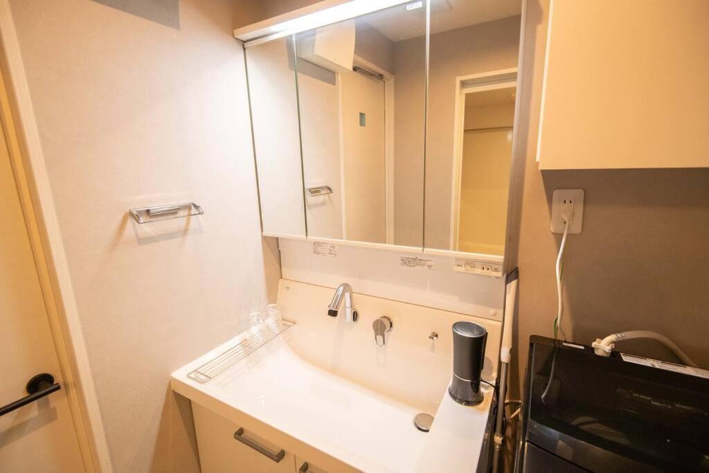 Apartment 浅草禅心居301室 浅草駅徒歩15分 2024年4月ニューオープン 43平米丸貸し切り ダブルベット2台と畳敷き布団2組 家庭式用品設備完備 *