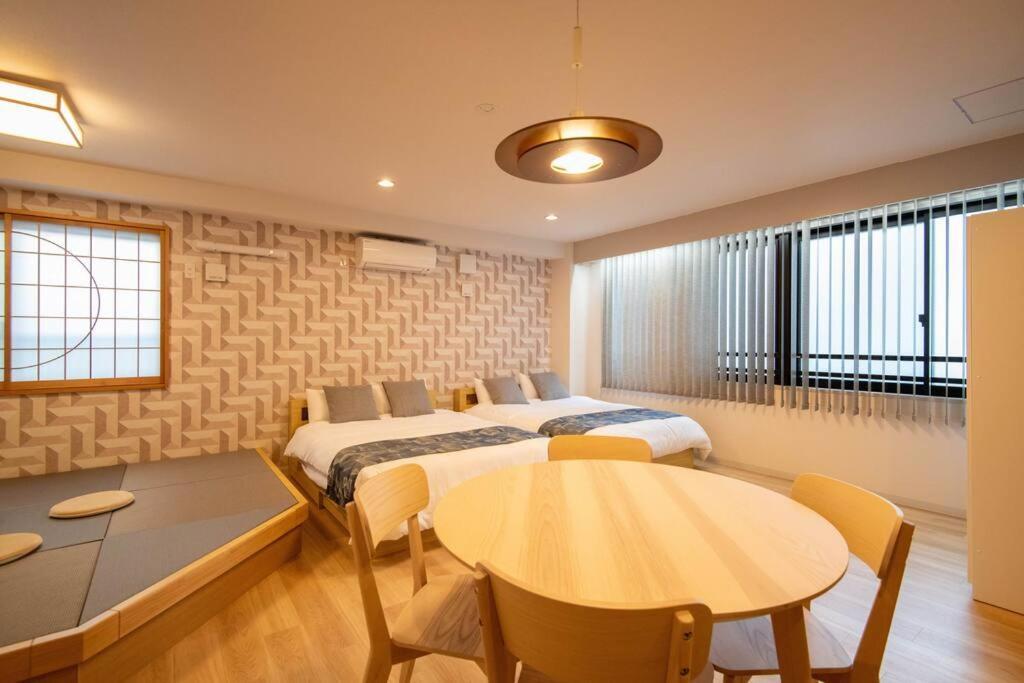 Apartment 浅草禅心居202室 浅草駅徒歩15分 2024年4月ニューオープン 43平米丸貸し切り ダブルベット2台と畳敷き布団2組 家庭式用品設備完備