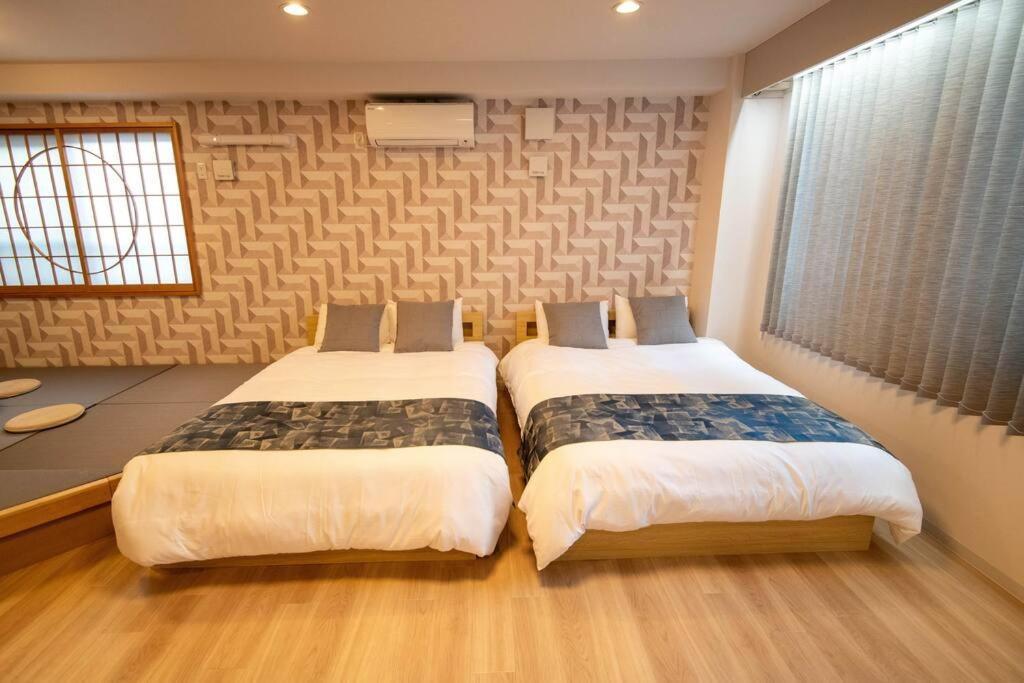 Apartment 浅草禅心居202室 浅草駅徒歩15分 2024年4月ニューオープン 43平米丸貸し切り ダブルベット2台と畳敷き布団2組 家庭式用品設備完備 Tokyo