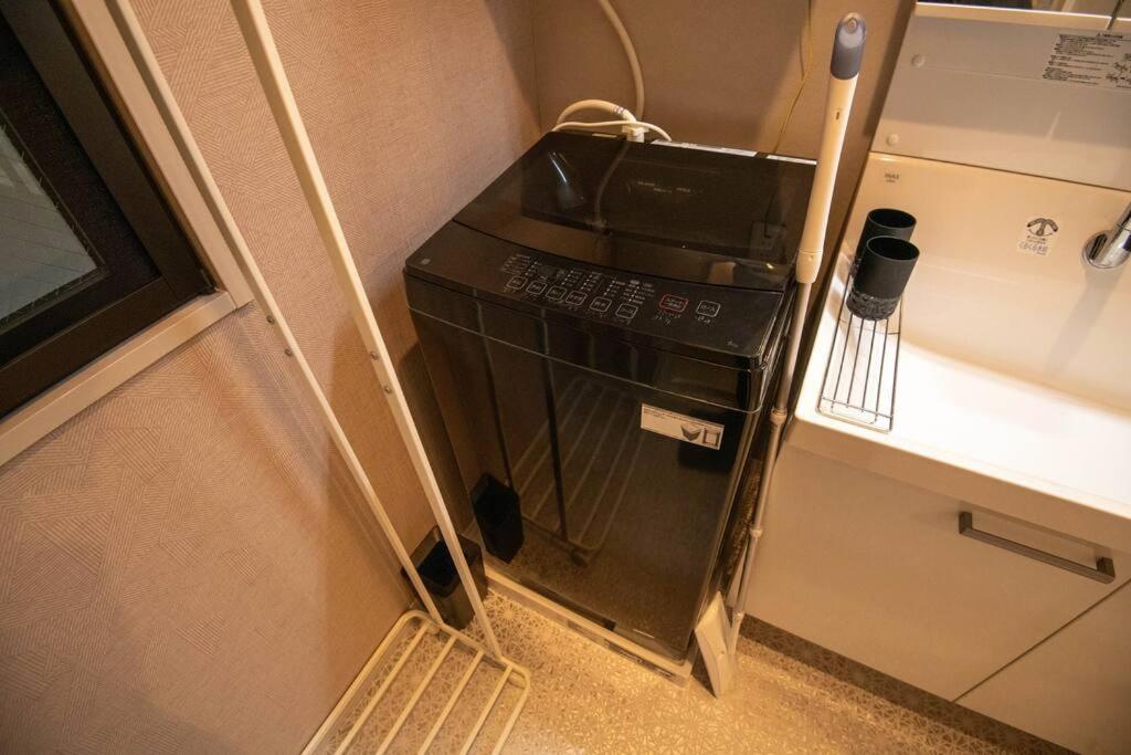 Apartment 浅草禅心居202室 浅草駅徒歩15分 2024年4月ニューオープン 43平米丸貸し切り ダブルベット2台と畳敷き布団2組 家庭式用品設備完備