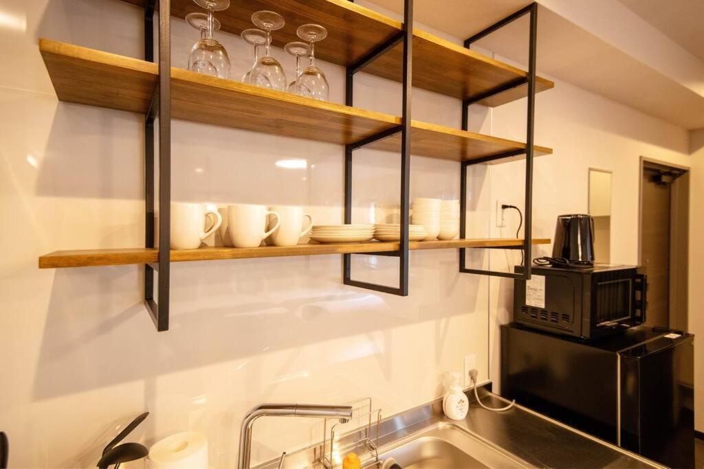 Apartment 浅草禅心居201室 浅草駅徒歩15分 2024年4月ニューオープン 43平米丸貸し切り ダブルベット2台と畳敷き布団2組 家庭式用品設備完備 *