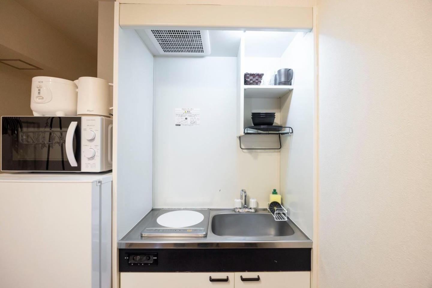 Shinjuku Okada Building Apartment *