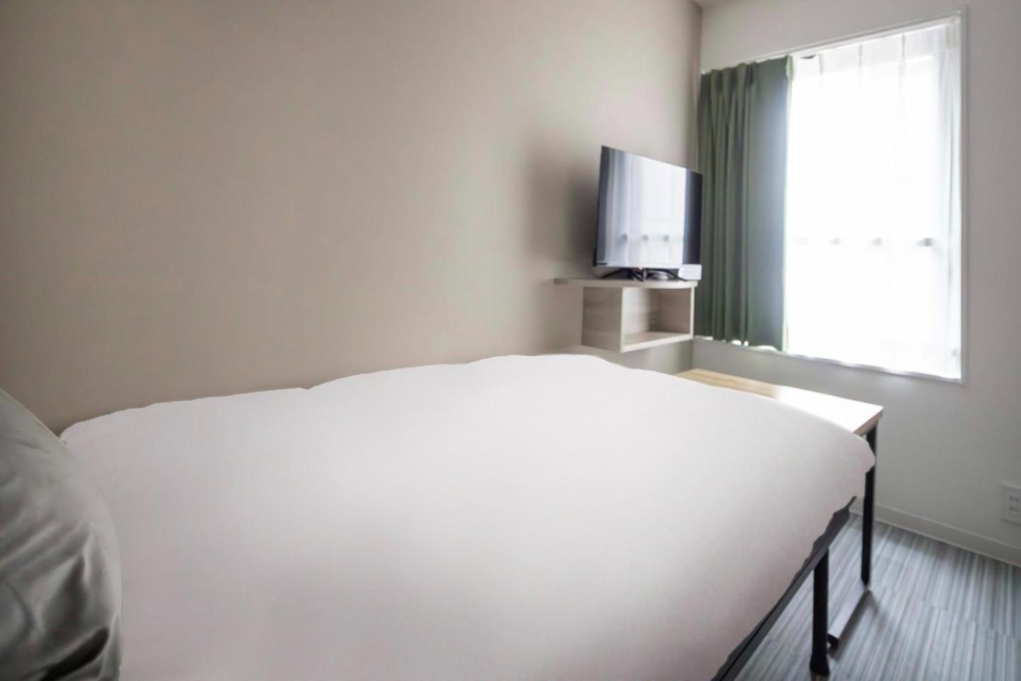 Ch Wasedaturumakicho Apartment *