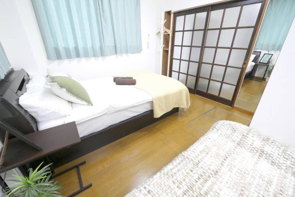 Apartment マスク配布ありa5 新宿10分 10人宿泊可能 出張在宅勤務に最適!!宿泊型テレワークスペース!!wifi完備 回線安定してます!!長期宿泊受付中 Tokyo