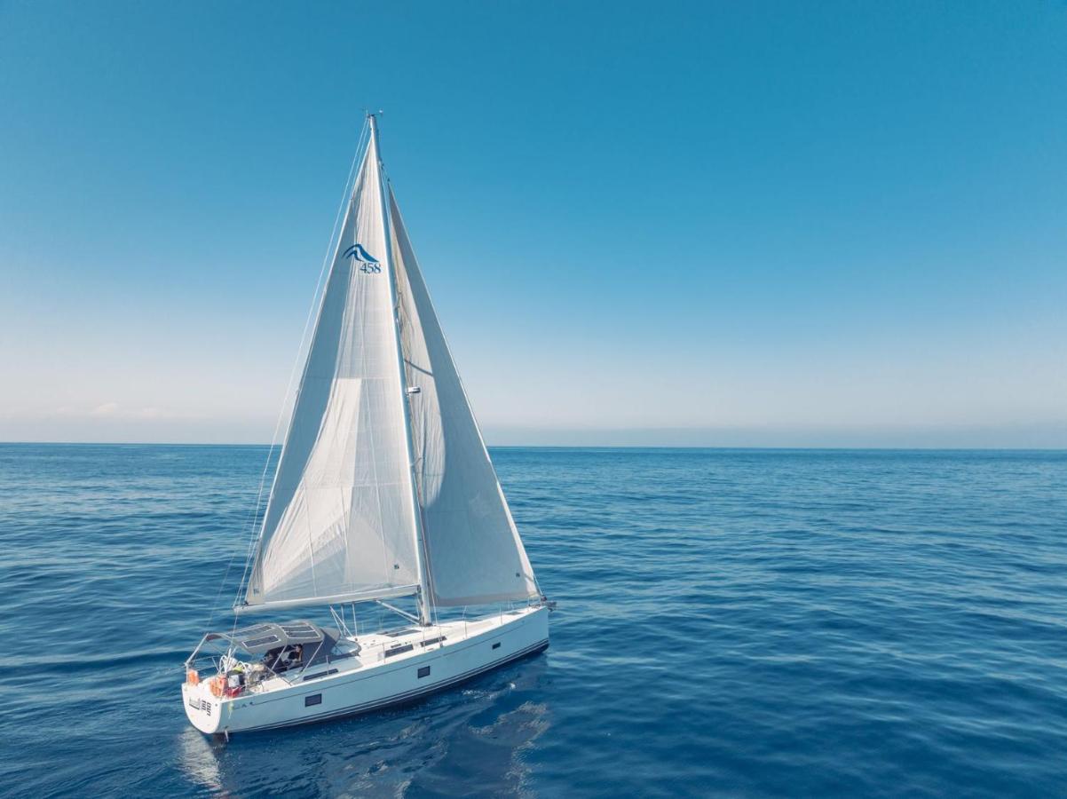 Sea Breeze With Luxury Yacht On Bay