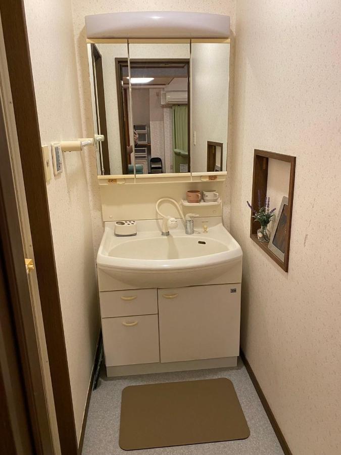 台東区寝室4つと広々吹き抜けリビングのメゾネットタイプのお家 Apartment Tokyo