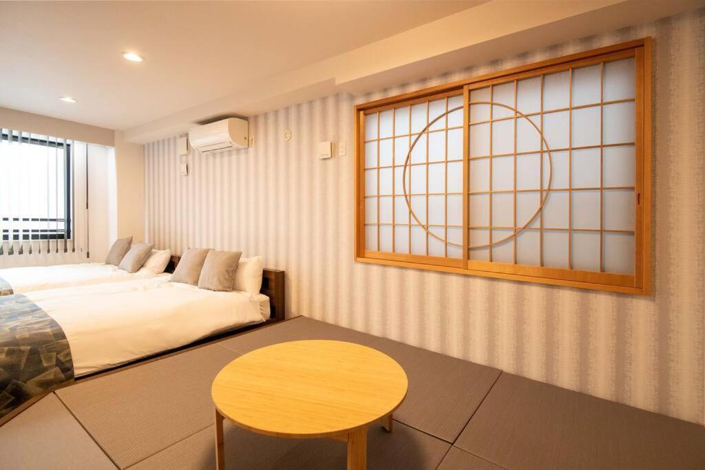 Apartment 浅草禅心居301室 浅草駅徒歩15分 2024年4月ニューオープン 43平米丸貸し切り ダブルベット2台と畳敷き布団2組 家庭式用品設備完備 *