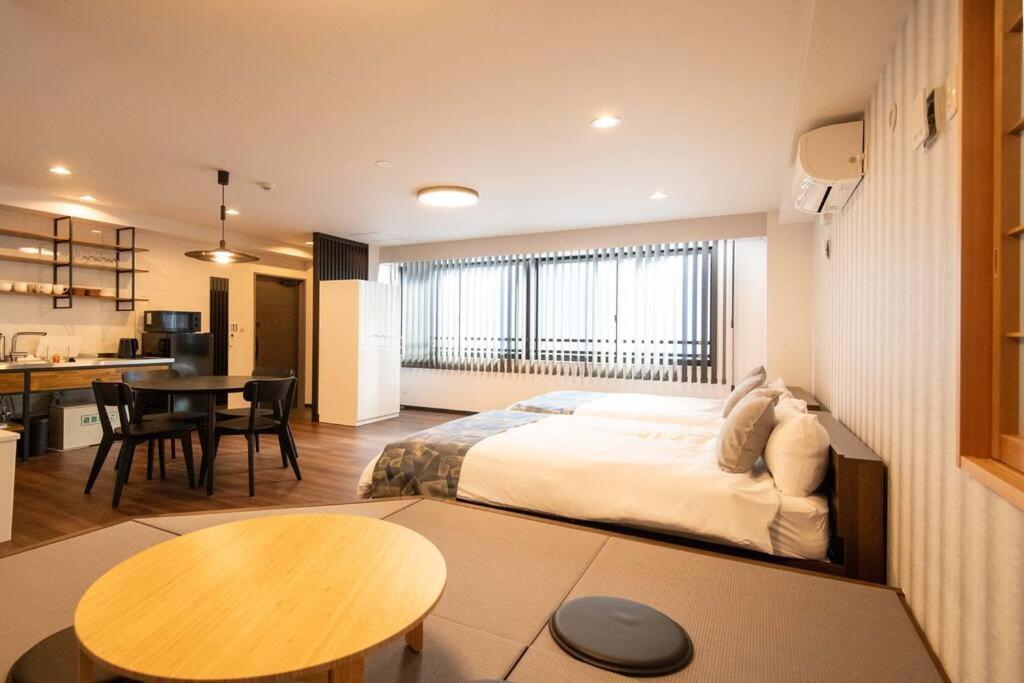 Apartment 浅草禅心居301室 浅草駅徒歩15分 2024年4月ニューオープン 43平米丸貸し切り ダブルベット2台と畳敷き布団2組 家庭式用品設備完備